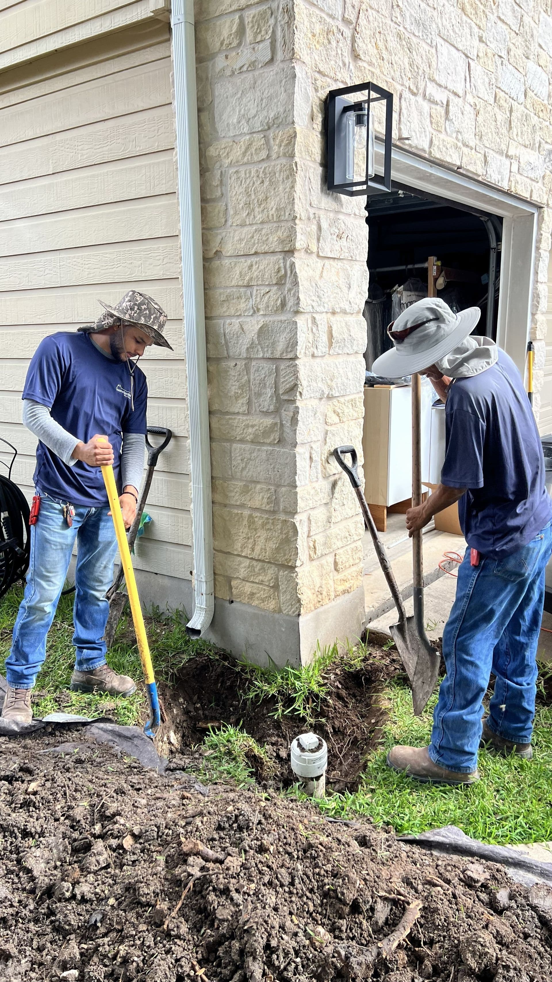 Plumbers digging.jpg